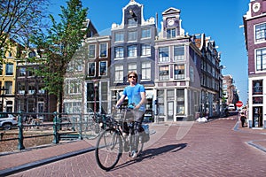 Man riding a bicycle in Amsterdam