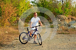 Man riding a bicycle in nature