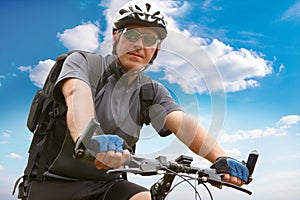 Man riding bike photo