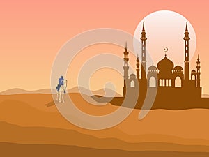 A man riding a camel in the desert has a mosque behind it.