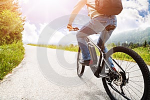 Man Riding Electric Mountain Bike