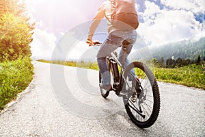 Man Riding Electric Mountain Bike