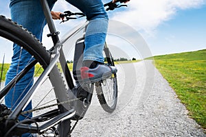 Man Riding Electric Mountain Bike