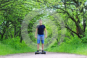 Man riding an electrical scooter outdoors