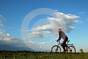 Man riding his bike