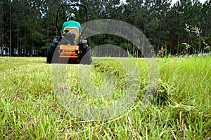 Man riding lawnmower