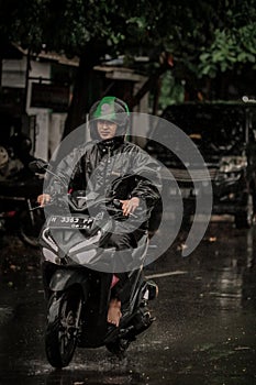 Man riding on the rain