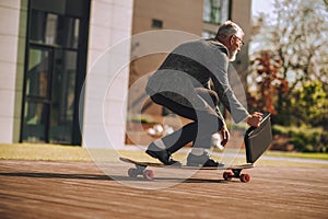 A man riding a skateboard and keeping balance