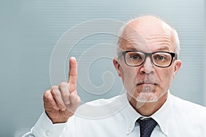 Man rising an index finger taking exception photo