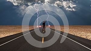 Man on road before storm