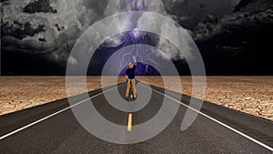 Man on road before storm