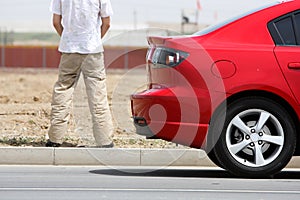 Man on the roadside rest photo