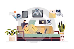 man with robots watching videos on laptop online education e-learning video tutorials live streaming artificial