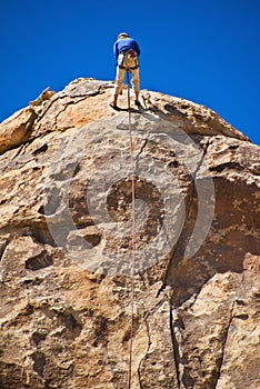 Man rock climbing, Joshua Tree National Park