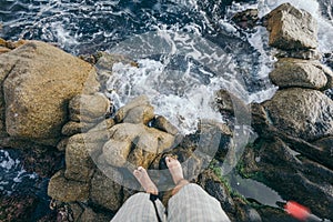 A man on a rocky beach