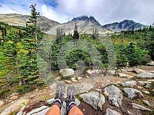 Man on a rocky mountain trail on Blackcomb Mountain, Whistler, British Columbia