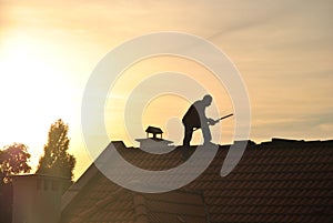 Man on a roof