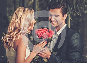 Man with roses dating his lady