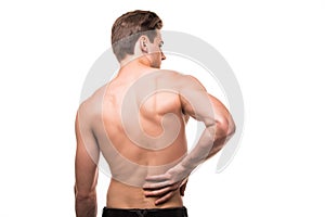 Man rubbing his painful back. Pain relief, chiropractic concept