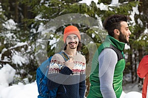Man With Rucksack People Group Snow Forest Young Friends Walking Outdoor Winter