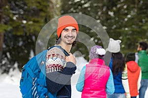 Man With Rucksack People Group Snow Forest Young Friends Walking Outdoor Winter