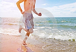 Man run on the Beach
