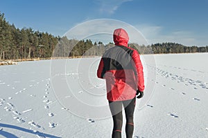 Man runner during outdoors winter race