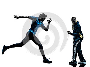 Man runner sprinter with coach stopwatch silhouette