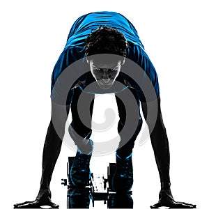 Man runner sprinter on starting blocks silhouette