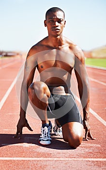 Man, runner and starting line for sprint, ready and sport or marathon, olympics and race or competition. Black male