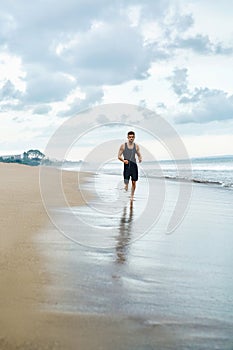 Man Running On Beach, Jogging During Outdoor Workout. Sports Con