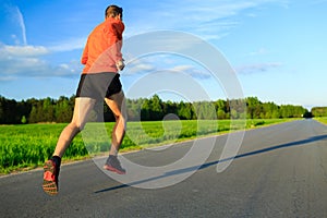 Man running on country road, training inspiration and motivation