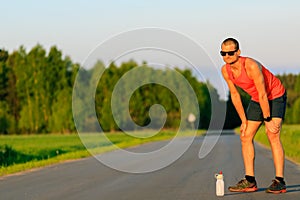 Man running on country road, training inspiration and motivation