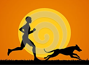 Man running jogging training exercising with his dog at sunset photo