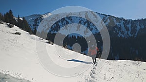 Man running at the mountain with snow