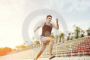 Man running on a racing track