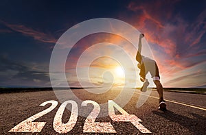 Man running and sprinting on road with 2024 photo
