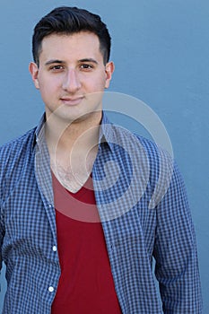 Man`s emotional close portrait with big expressive eyes significant nose, hairy chest and small stubble beard