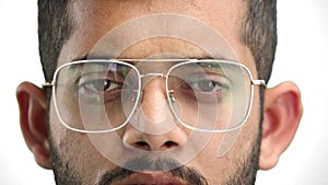 Man's face, on a white background, close-up