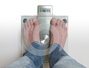 Man`s feet on weight scale - Diabetes