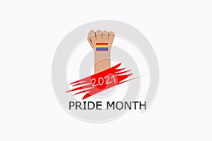 Man`s hand back side handful with small rainbow sticker on wrist the symbol of LGBQ community  equality movement