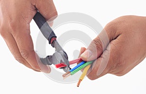 Man's hand hold cutter to strip electrical wire