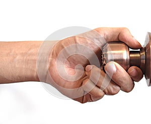 Man's hand hold doorknob on isolate white background photo