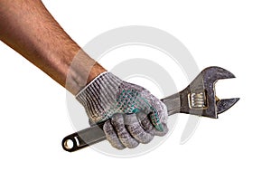 man`s hand holding adjustable wrench