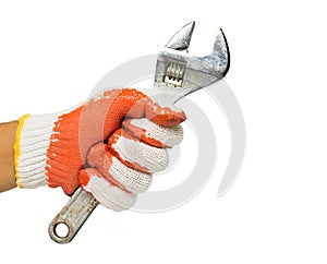 A man`s hand holding adjustable wrench isolated on white background. Mechanic and repairman. Handyman. DIY