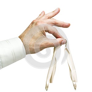 Man`s hand holding a bag with a gift