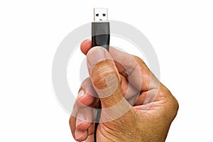 Man`s hand holding usb cable on white background