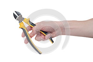 Man`s hand holding a black and yellow wire cutter. Open, clean, ready to cut form