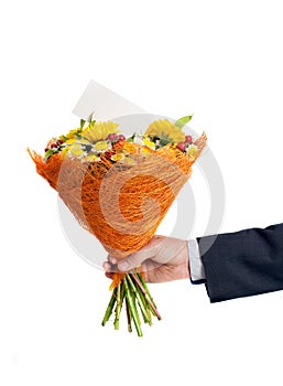 Man's hand is holding a bouquet