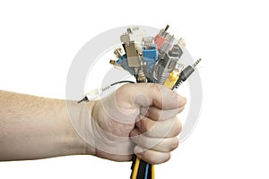 Man's hand holding cables